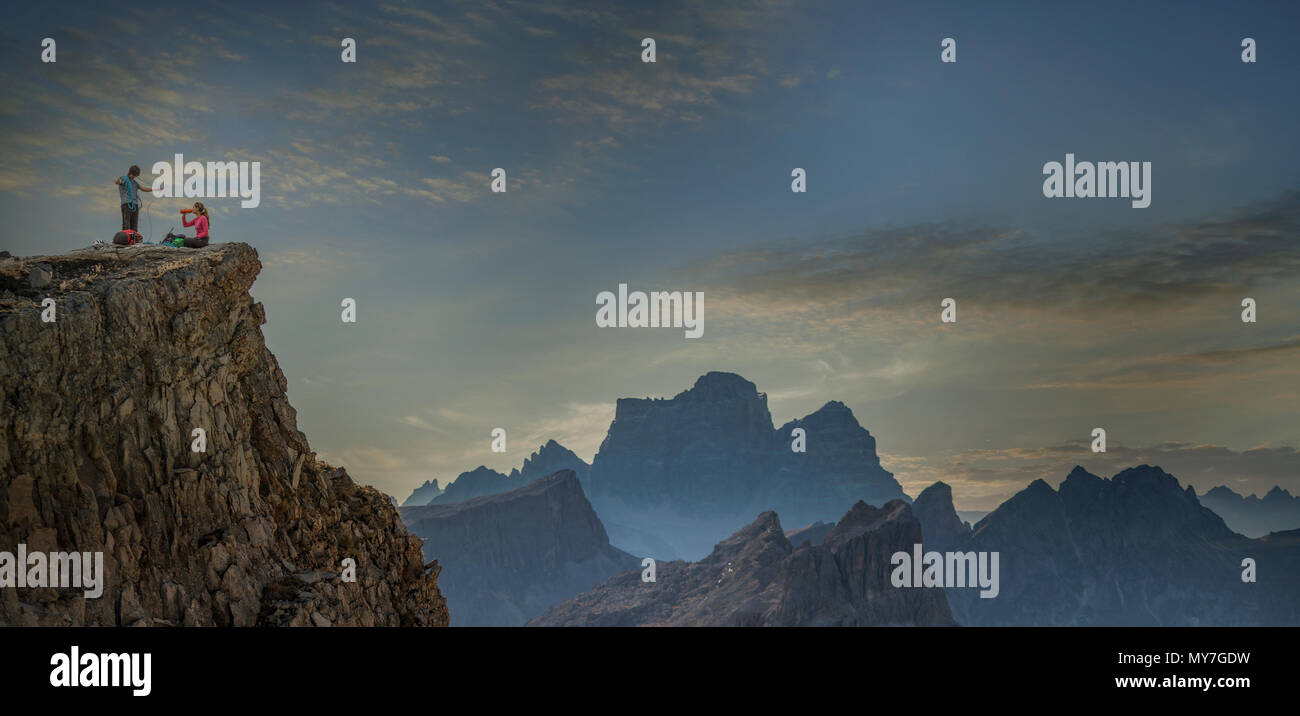 Climbers on mountain top, Dolomites, Cortina d'Ampezzo, Veneto, Italy Stock Photo