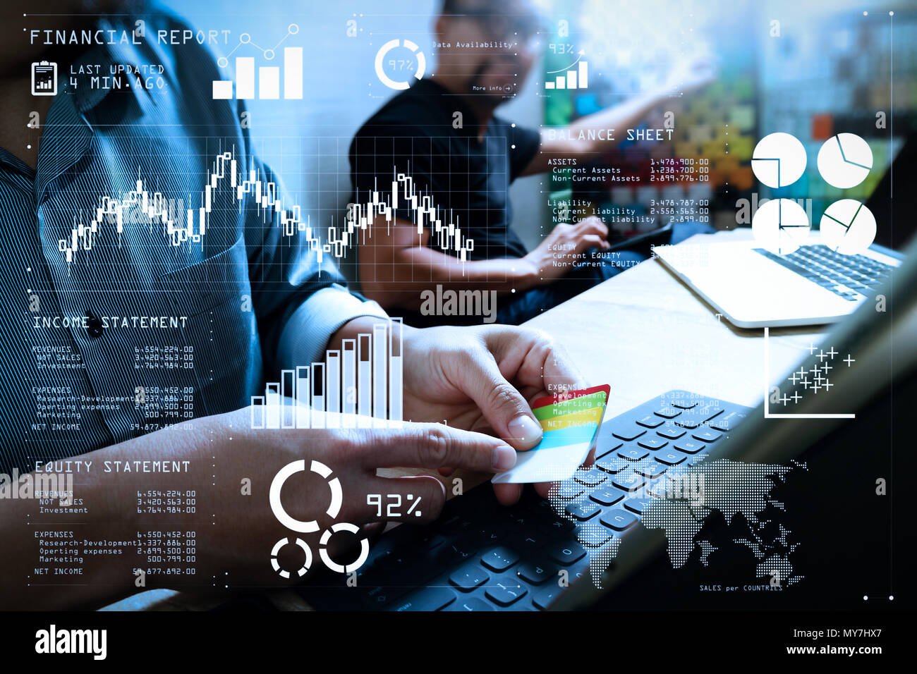 Financial report data of business operations (balance sheet and  income statement and diagram) as Fintech concept.Coworking process, entrepreneur team Stock Photo
