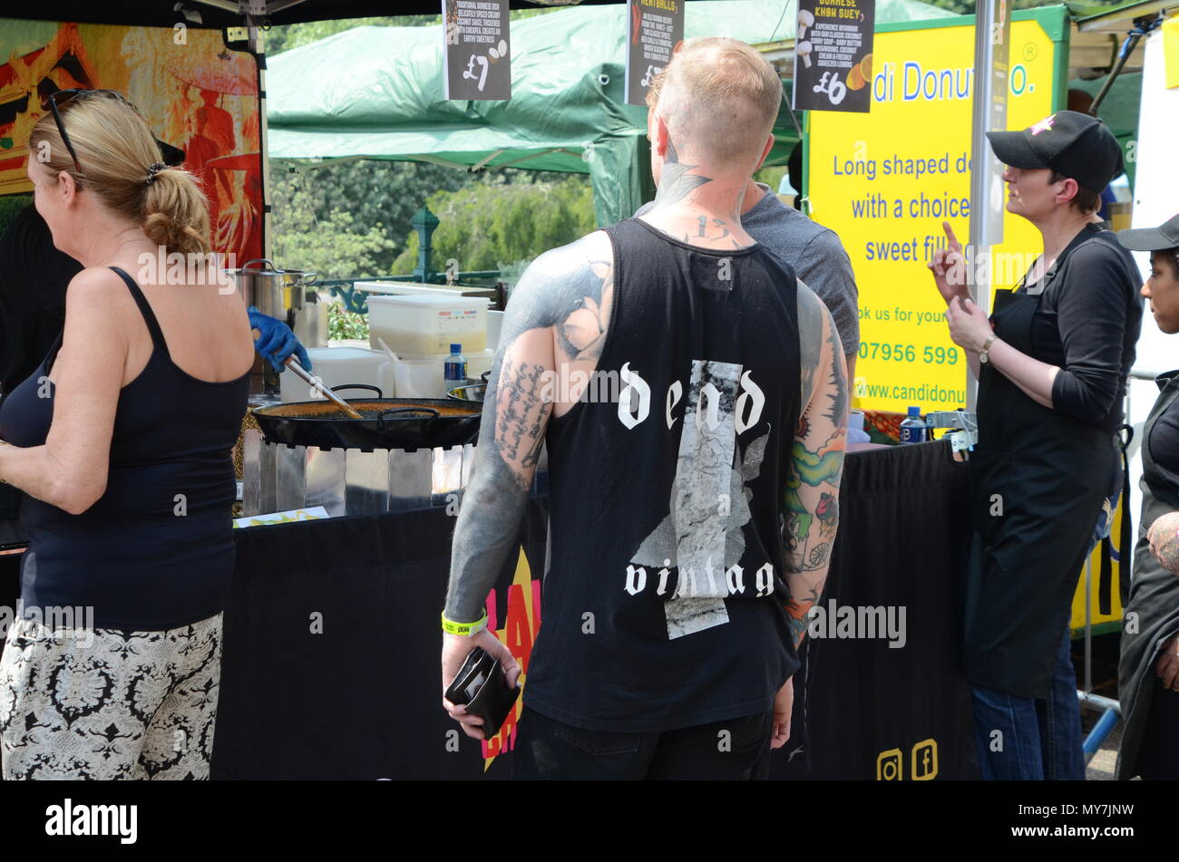 tattooed people attending the alexandra palace tattoo expo 2018 London UK Stock Photo