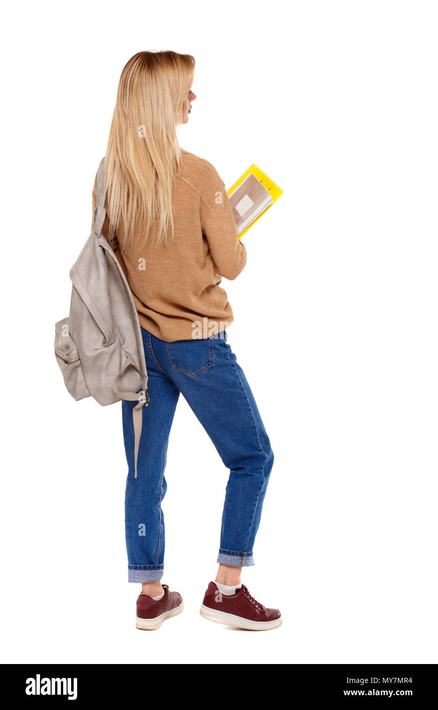 Back view of woman with notebooks and backpack. backside view of person ...