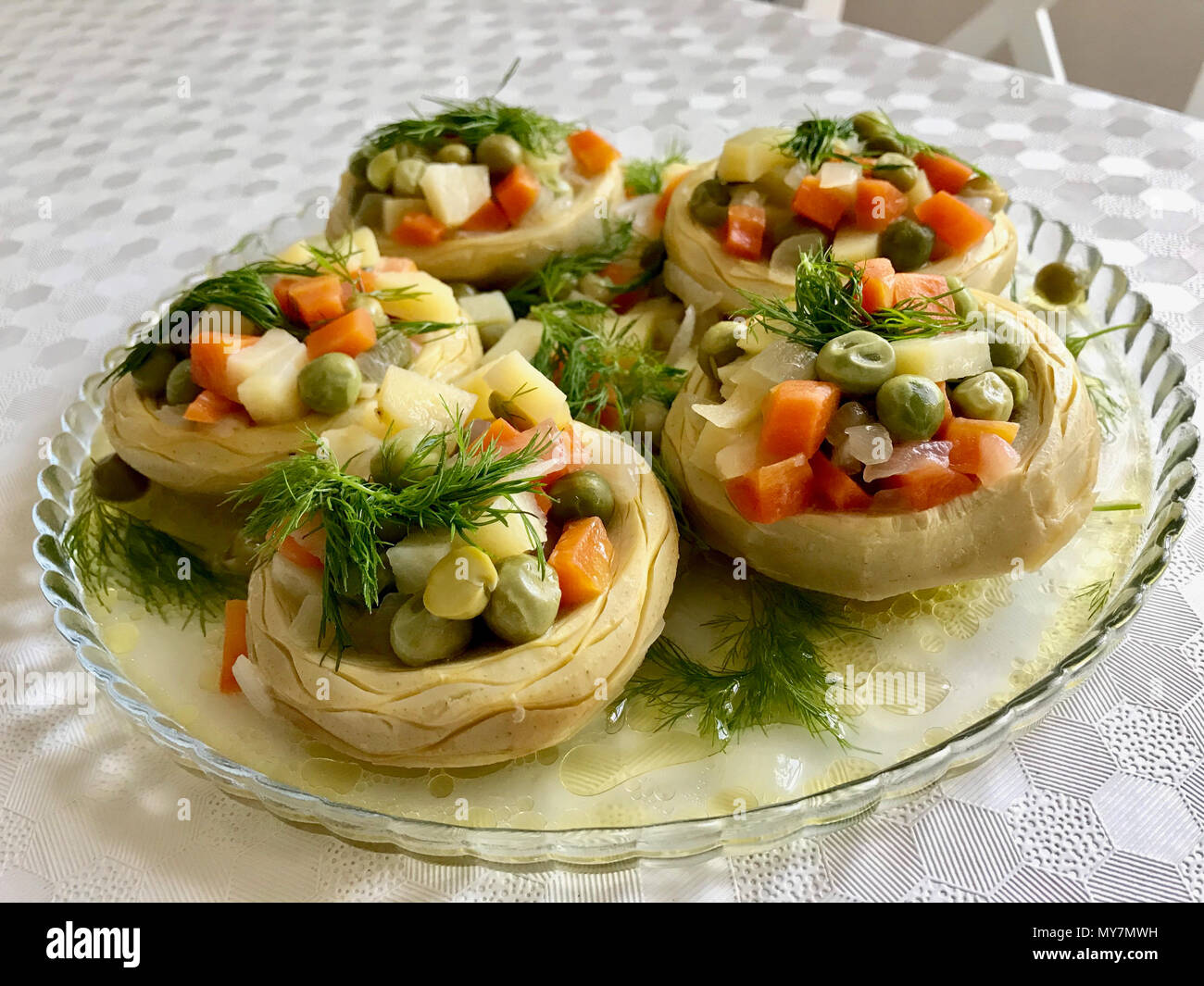Turkish Food Homemade Artichokes with Green Peas, Carrot, Potatoes and