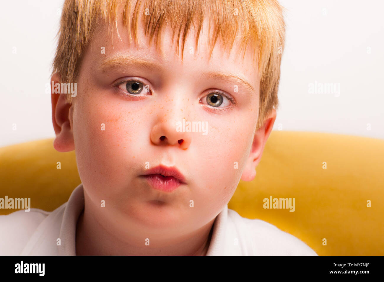 Little boy looking at camera Stock Photo