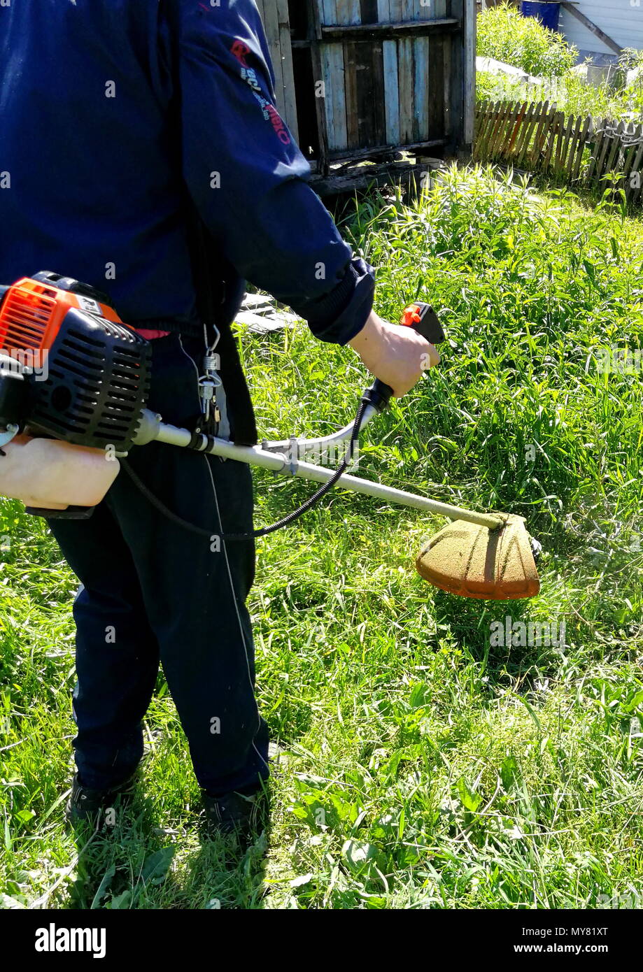 Manual hand grass cutter hi-res stock photography and images - Alamy