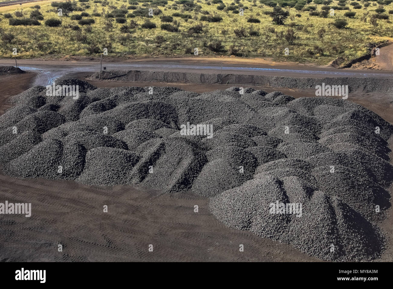 Manganese Mining and processing is done in multiple stages. It is necessary to store piles of crushed rock for further processing Stock Photo