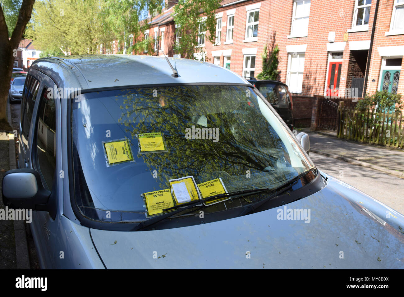 Parking tickets on car parked on permit only street in Norwich - in total, 7 tickets were issued. UK May 2018 Stock Photo