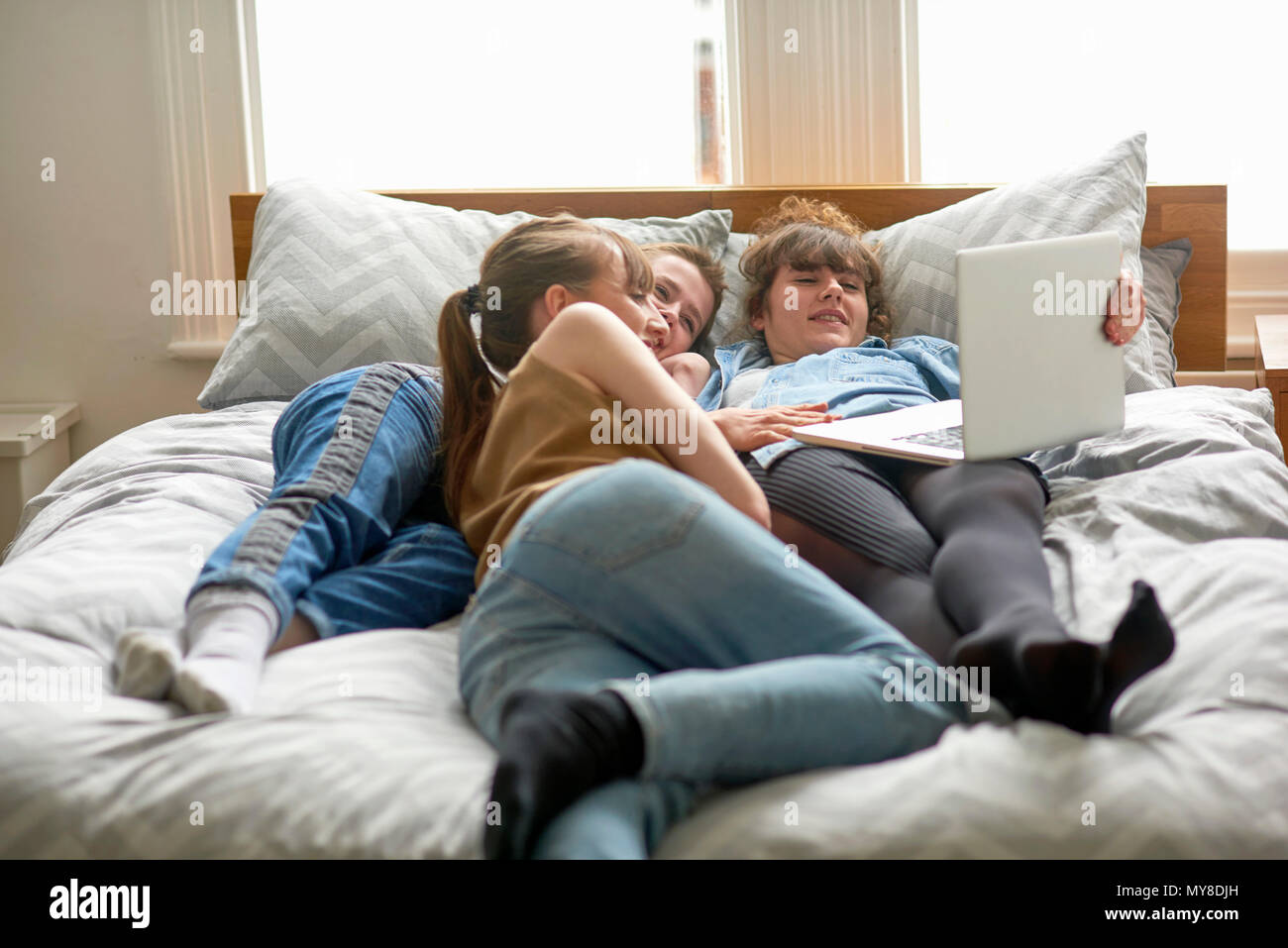 Resting on thigh hires stock photography and images Alamy