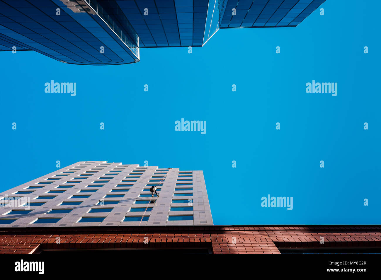 Modern building exterior cleaning hi-res stock photography and images ...