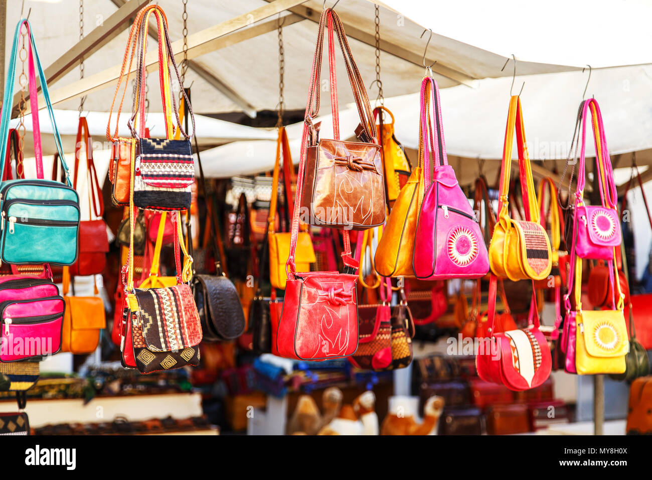 Leather and textile bags in tunisian market, Sidi Bou Said, Tunisia ...
