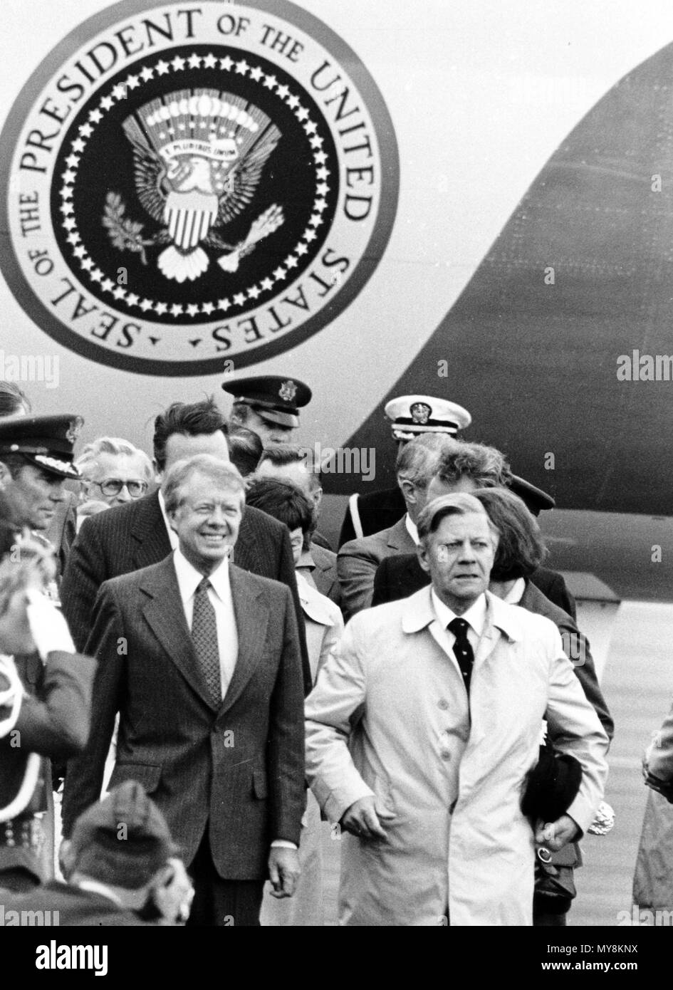 US President Jimmy Carter (L) and German Chancellor Helmut Schmidt (R) after the reception at the military part of Rhein Main Airport in Frankfurt am Main on 15 July 1978. On the left is US General William John Evans, commander of Allied Air Forces Central Europe. On the second day of his state visit to the German Federal Republic and West Berlin, US President Jimmy Carter arrived in Frankfurt am Main in the morning on 15 July 1978, before flying on to West-Berlin in the early afternoon.   | usage worldwide Stock Photo