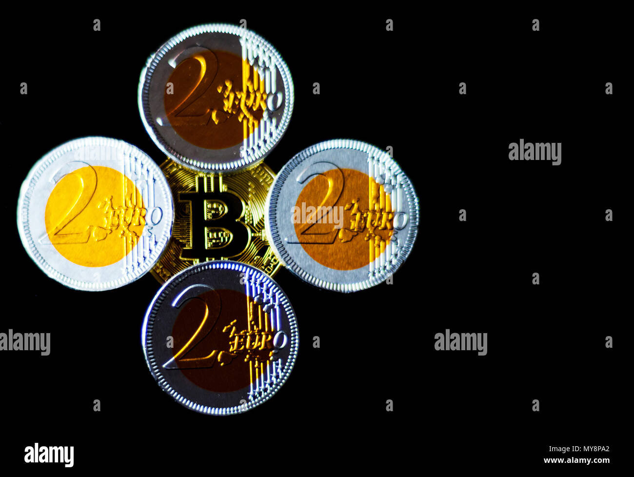 Crypto currency Gold Bitcoin with chocolate euro, BTC, macro shot of Bitcoin  coins on black background, bitcoin mining concept Stock Photo - Alamy