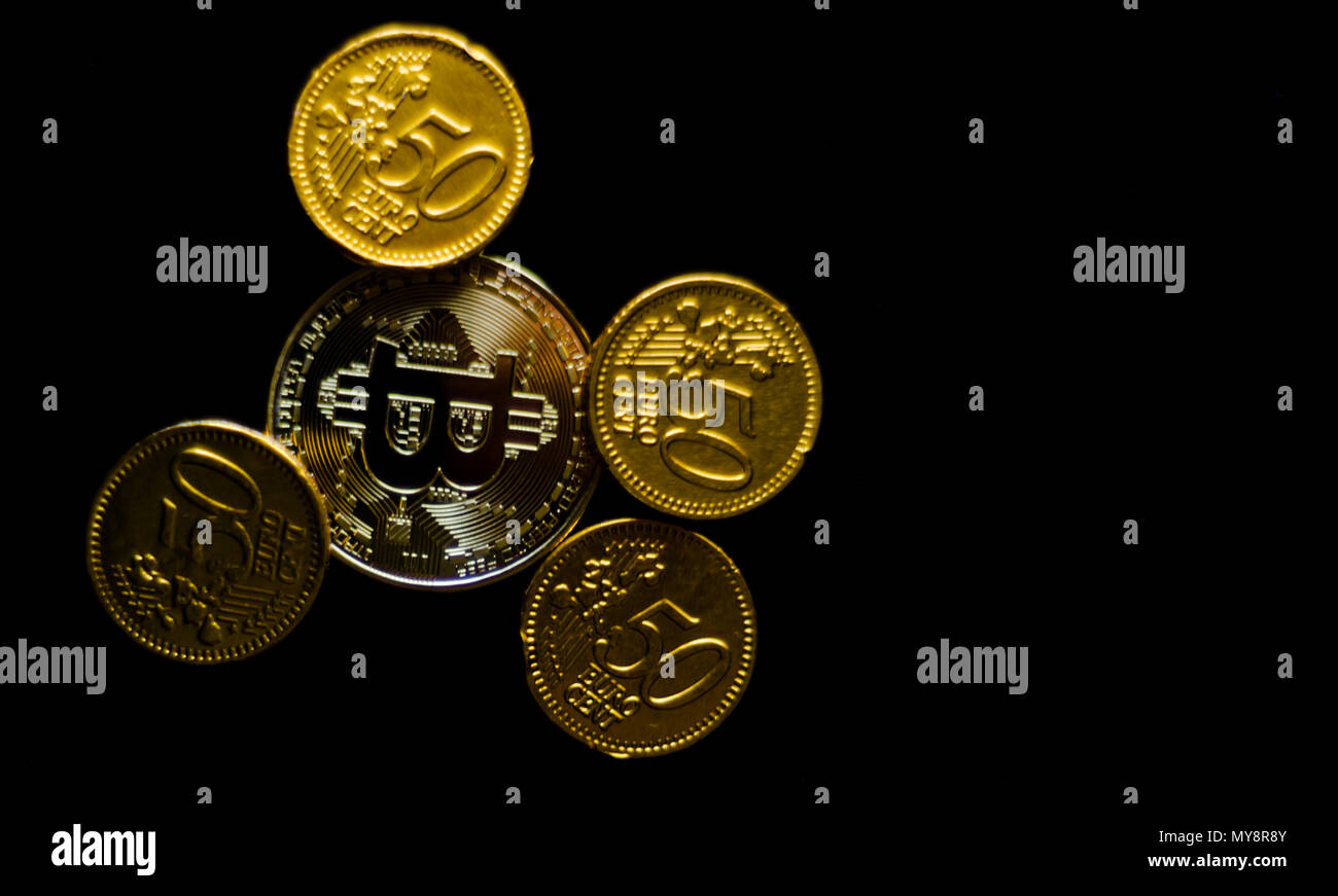 Crypto currency Gold Bitcoin with chocolate euro, BTC, macro shot of Bitcoin  coins on black background, bitcoin mining concept Stock Photo - Alamy