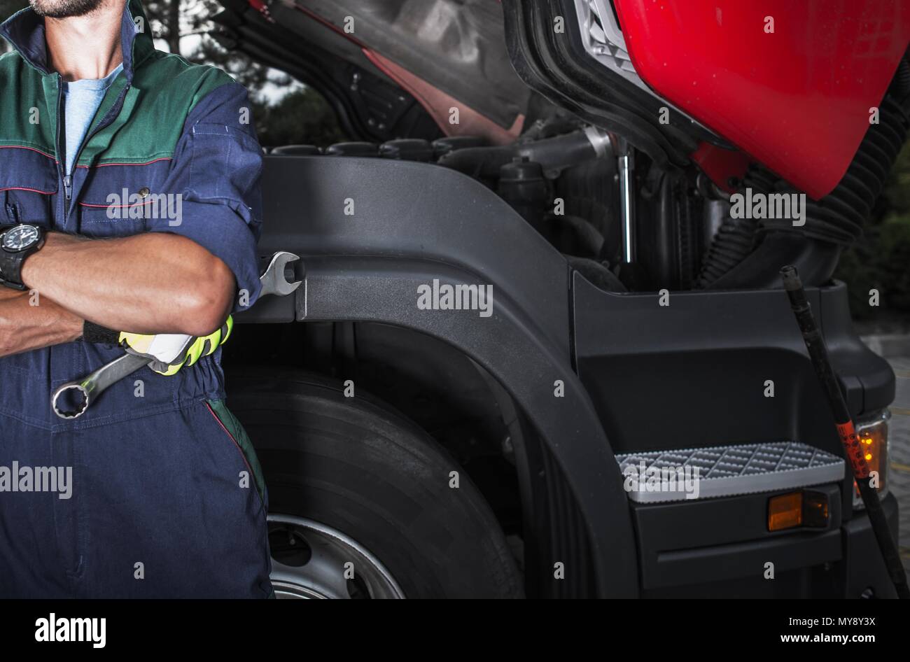 Semi Truck Mechanic Job. Caucasian Truck Service Technician with the