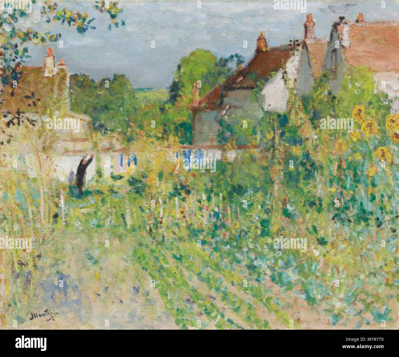 177 Femme étendant du Linge Stock Photo