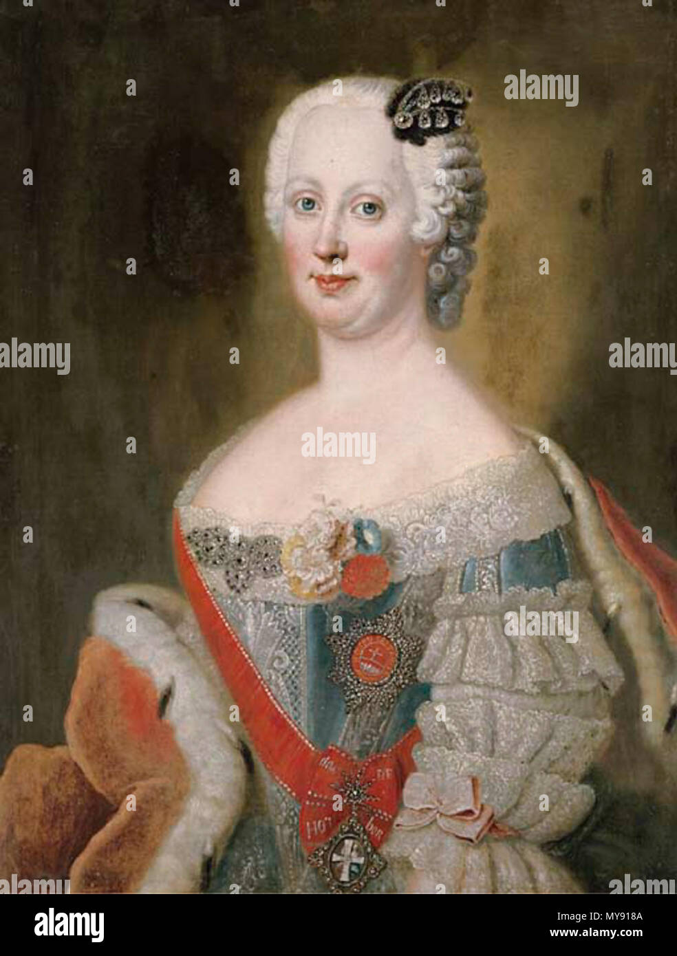 . Portrait of noblewoman, traditionally identified as Catherine the Great (l762-1796), Empress of Russia, bust-length, in a blue silk dress with lace trim and an ermine-lined cloak oil on canvas 32 x 24½ in. (81.3 x 61.6 cm.) PROPERTY FROM THE ESTATE OF BARONESS AIDA NORA VON DEM BUSSCHE-STREITHORST We are grateful to Sir John Guinness for pointing out that the sitter is in fact Johanna Elizabeth, Princess of Holstein-Gottorp (1712-1760), wife of Prince Christian August, Prince of Anhalt-Zerbst (1690-1727) and mother of the Tsarina Catherine the Great, wearing the Order of Saint Catherine. The Stock Photo