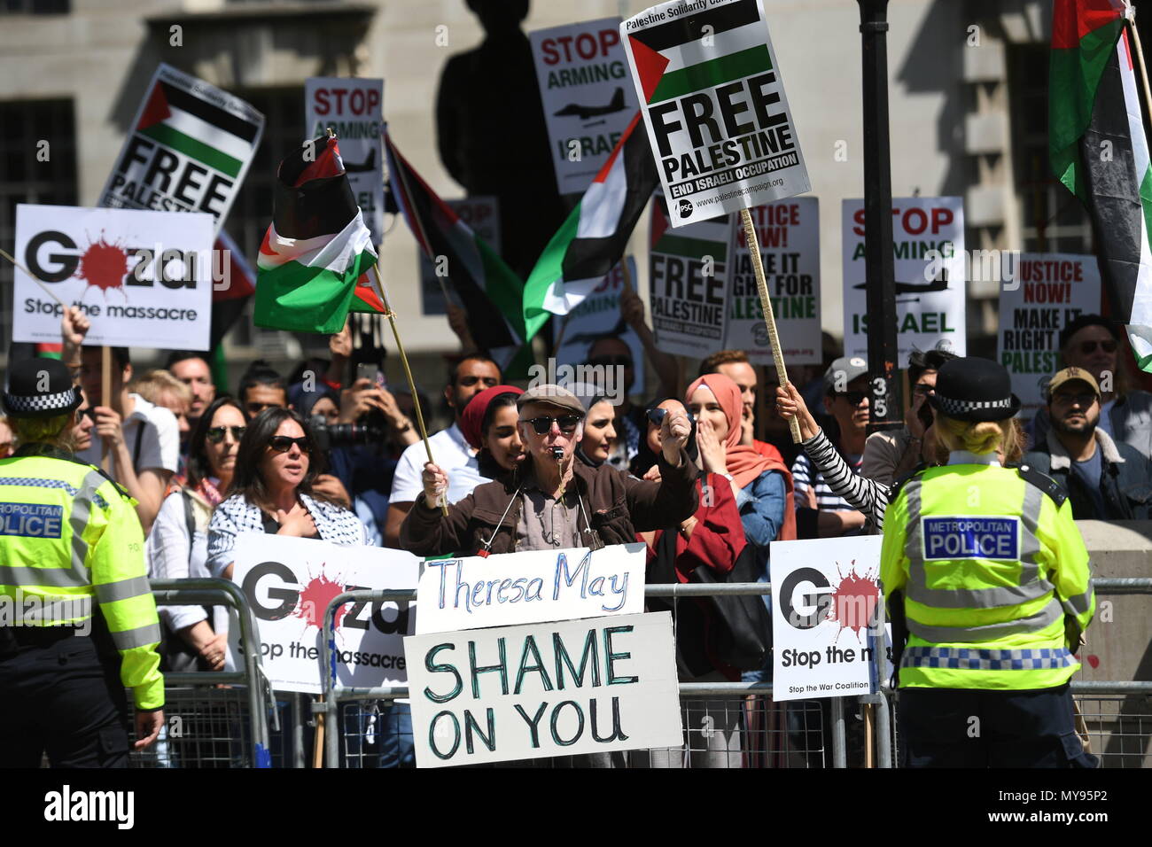 Demonstrators on Whitehall ahead of the arrival of Israeli Prime Minister Benjamin Netanyahu for a bilateral meeting with Prime Minister Theresa May at 10 Downing Street, London. Stock Photo