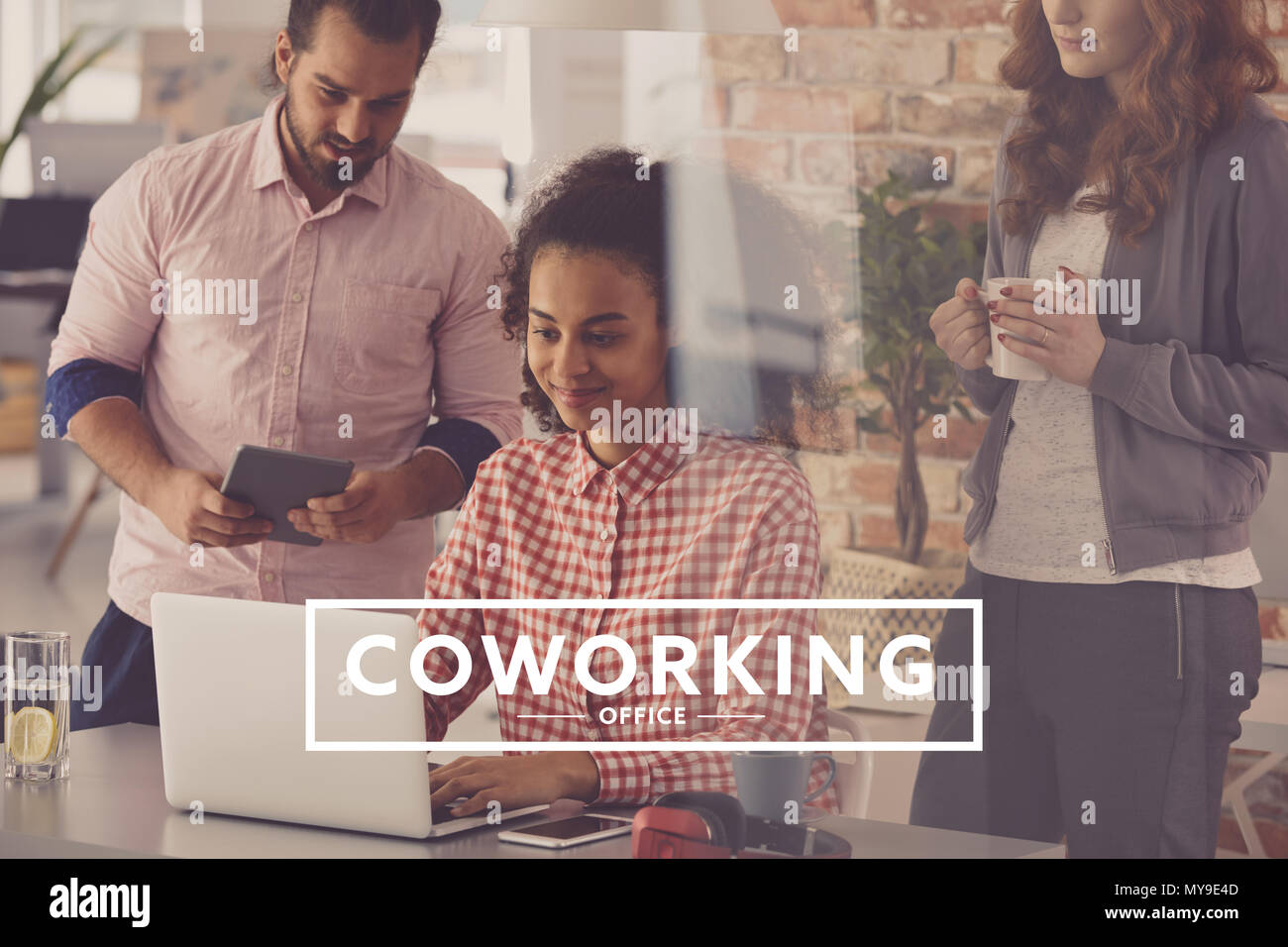 Young people working in creative agency, coworking office Stock Photo