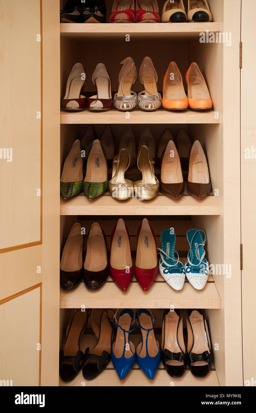 High heels in wardrobe Stock Photo - Alamy