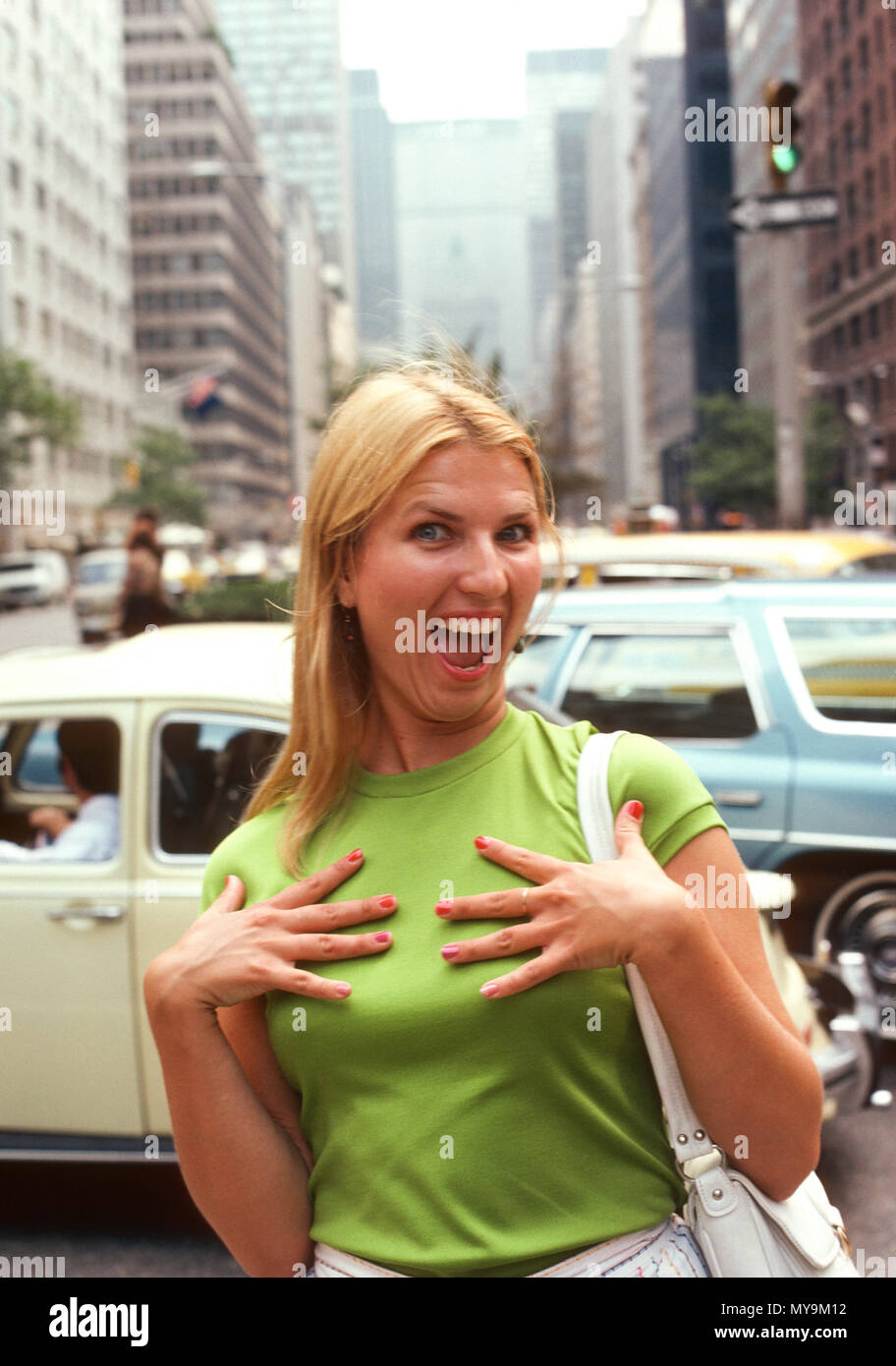 happy Blond Woman shows off her New Manicured nails, 1974, NYC, USA Stock Photo