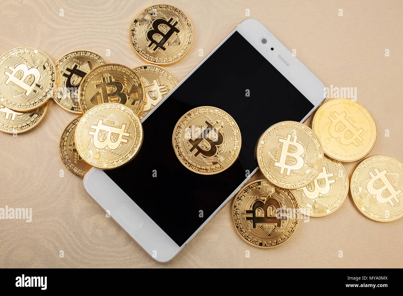 Bitcoin on the mobile phone. crypto currency concept Stock Photo - Alamy