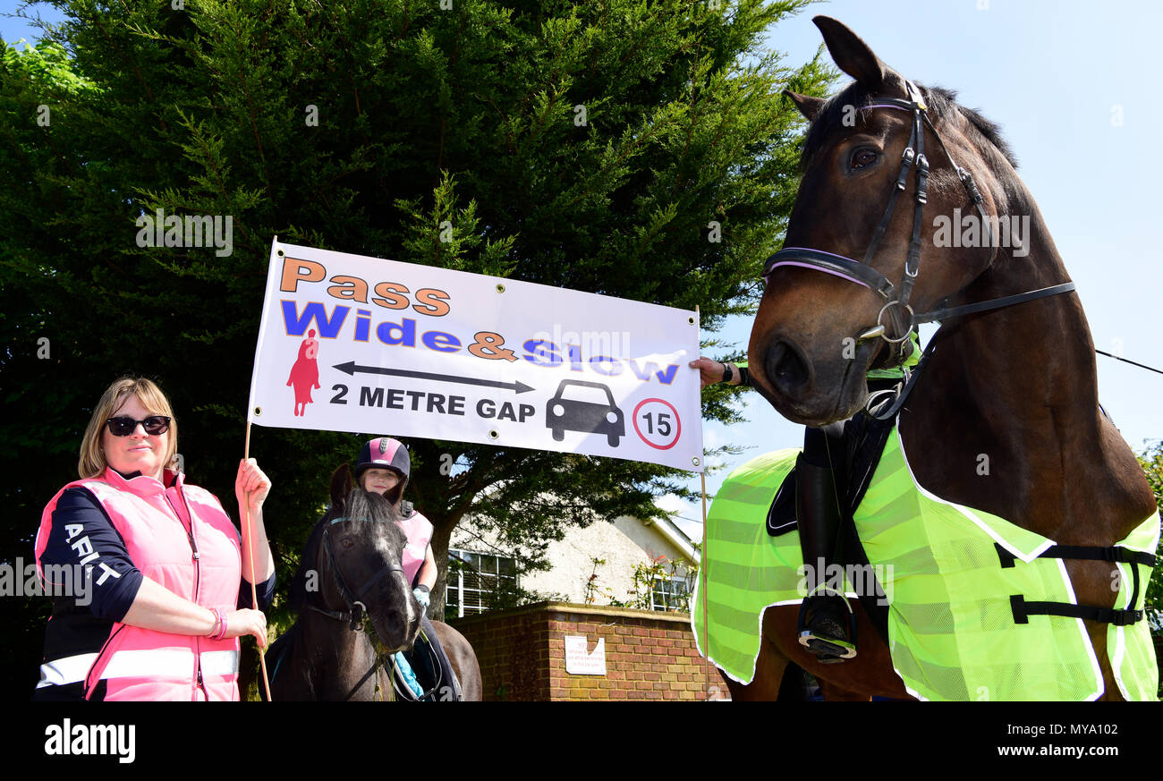 Local residents in the village of Binsted campaigning for motorists and other road users to allow more room for horses, Binsted, Hants, UK. 20.05.2018. Stock Photo