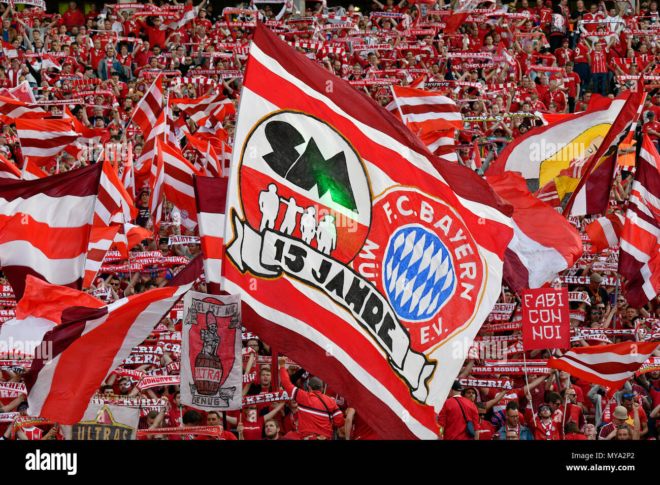 Fan section FC Bayern with waving flags, DFB Cup Final 2018, Olympiastadion Berlin, Germany Stock Photo