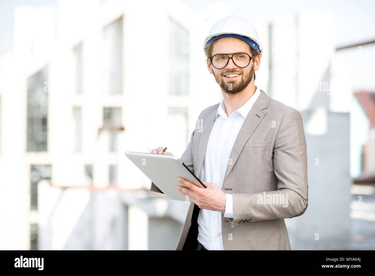 Engineer with tablet on the structure Stock Photo