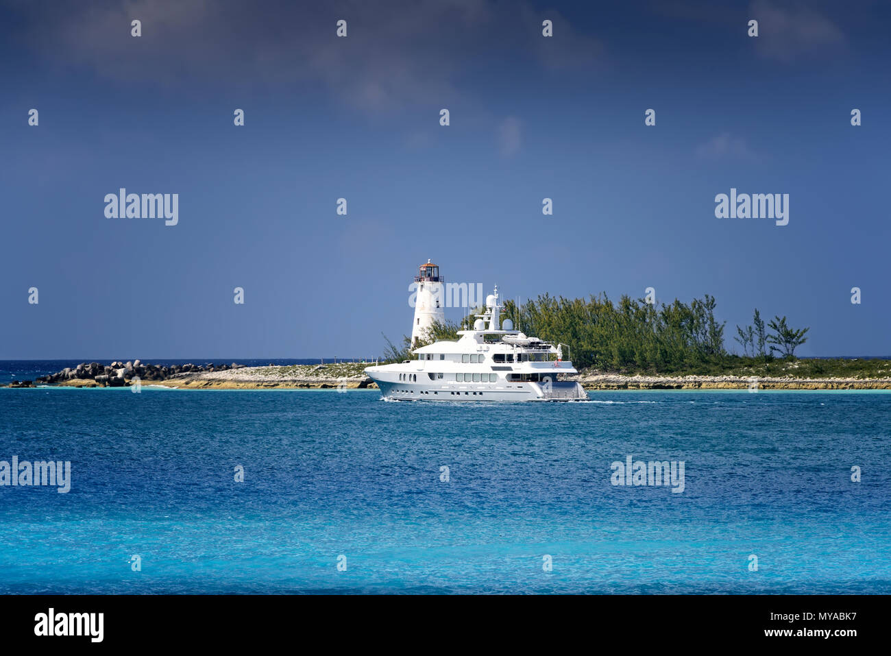 Yacht sailing on the Caribbean Sea near the tip of Paradise Island in the Bahamas Stock Photo