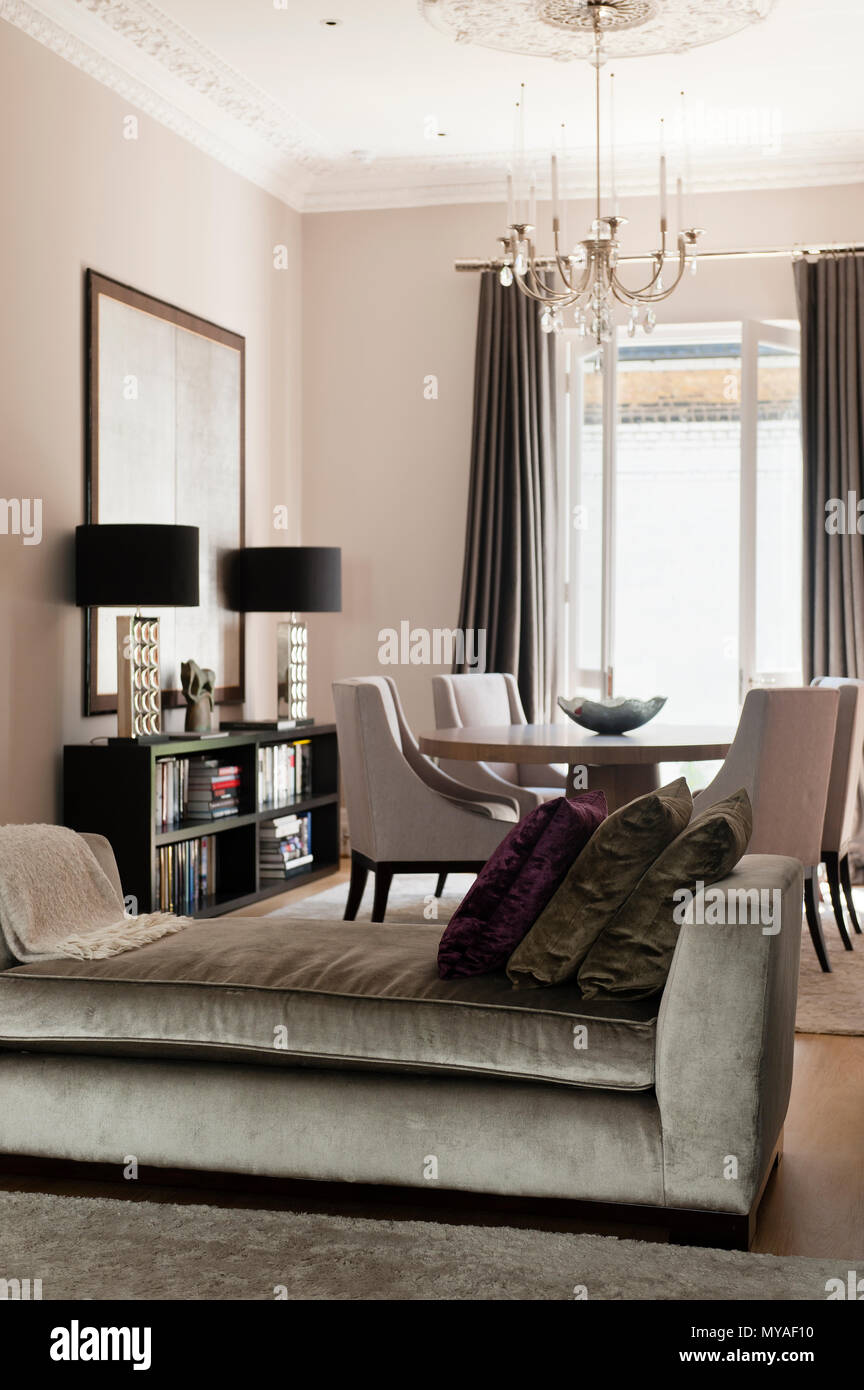 Sofa and dining table in townhouse Stock Photo Alamy