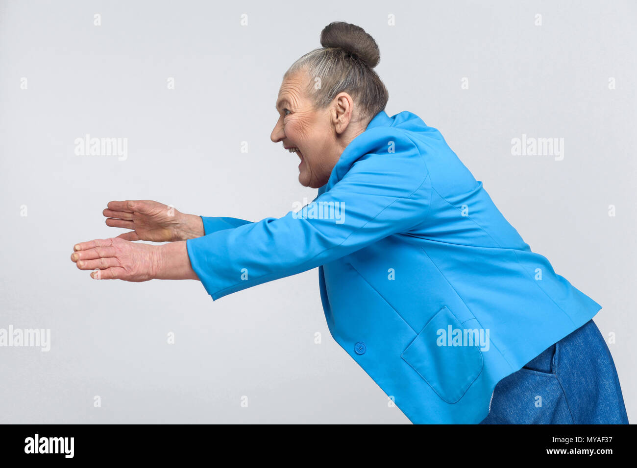 Toothy smile standing open arm hi-res stock photography and images - Alamy