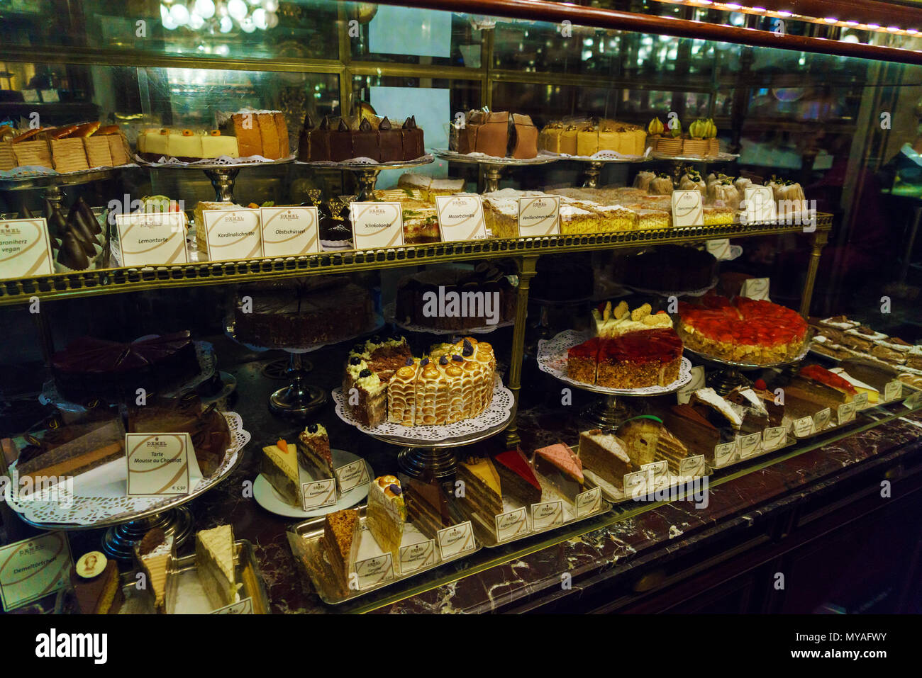 Vienna, Austria - October 22, 2017: A huge selection of cakes, pastries and other sweets in the window of the famous confectionery cafe Demel Stock Photo