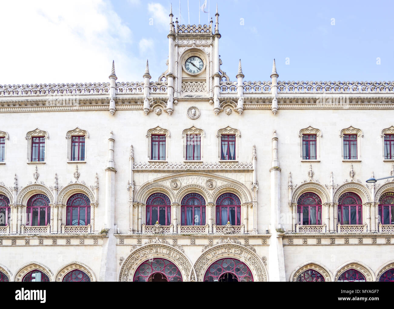 lisbon, rossio station. building facade with clock Stock Photo Alamy