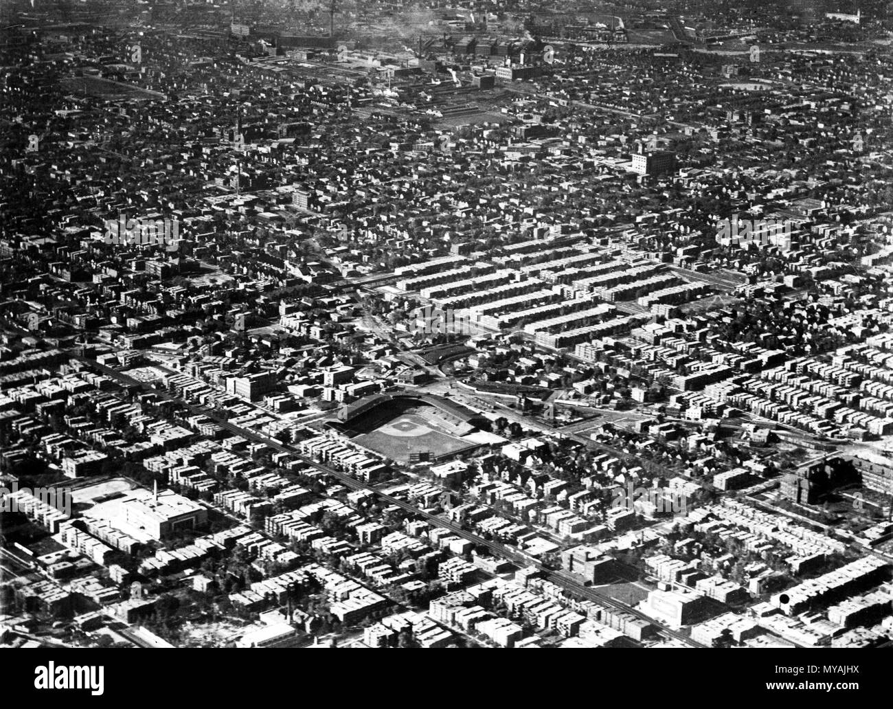 Aerial View Of Wrigley Field With Chicago, Illinois Skyline In