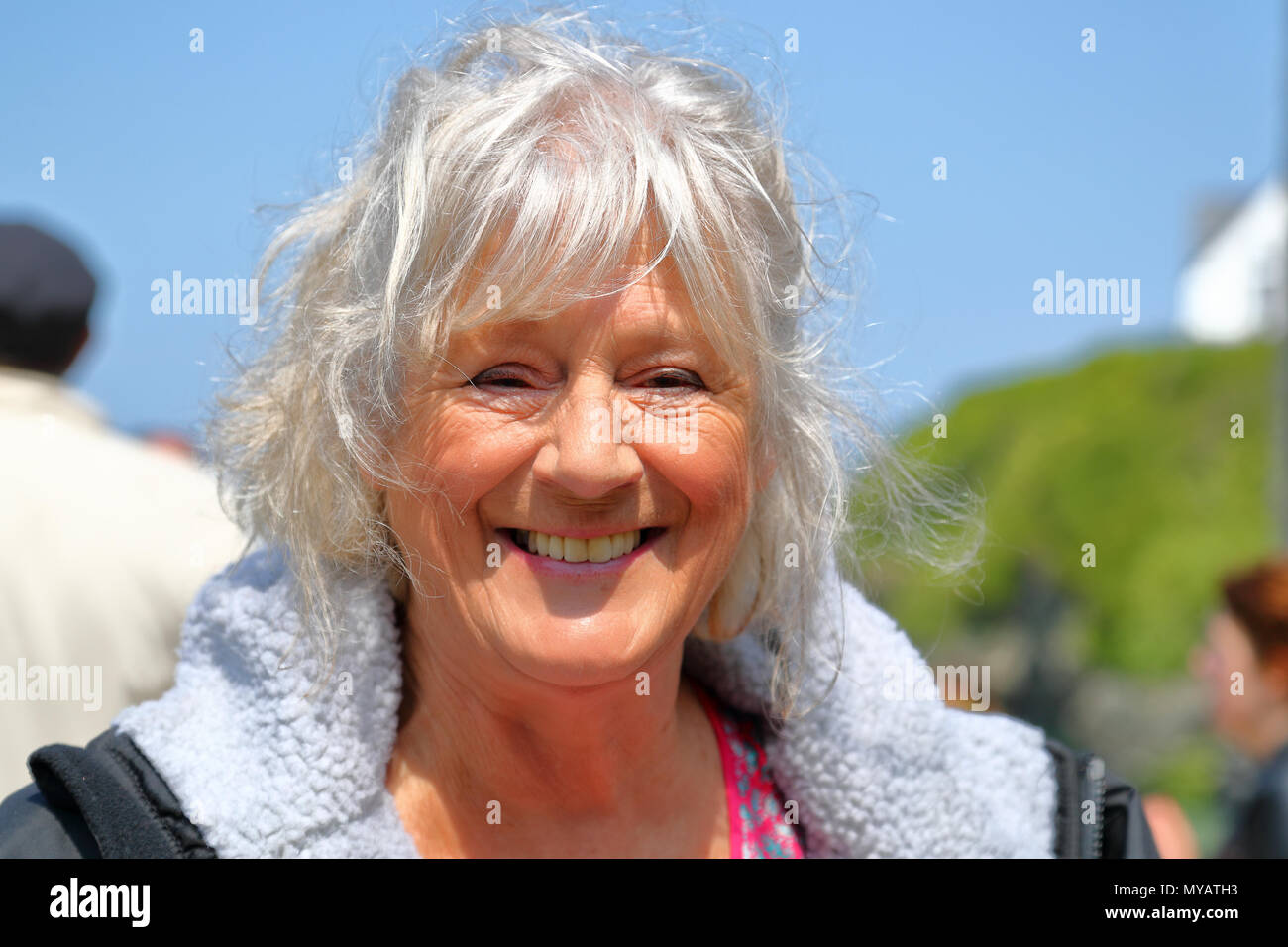 Actress Maggie Steed on set of the filming of 'Fishermen's Friends' at Port Isaac, Cornwall, UK Stock Photo