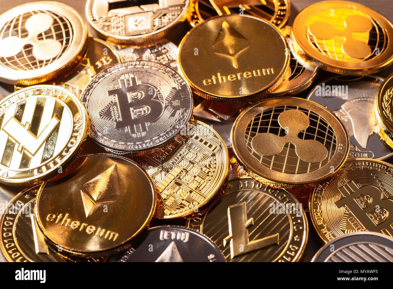 Many coins of various cryptocurrencies | usage worldwide Stock Photo