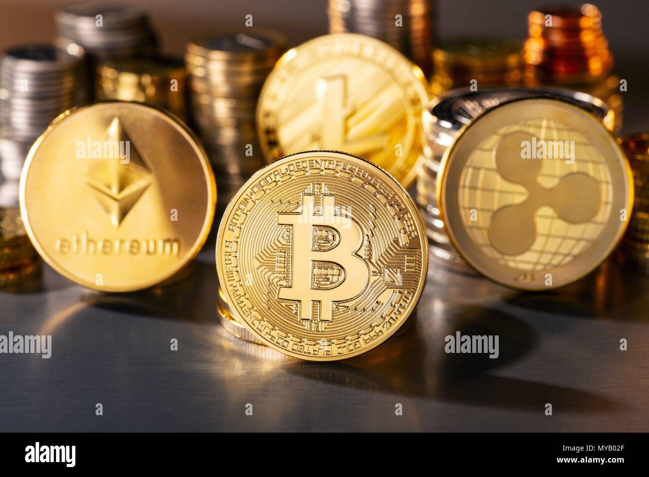 Coins of the four crypto currencies with the highest market capitalization | usage worldwide Stock Photo
