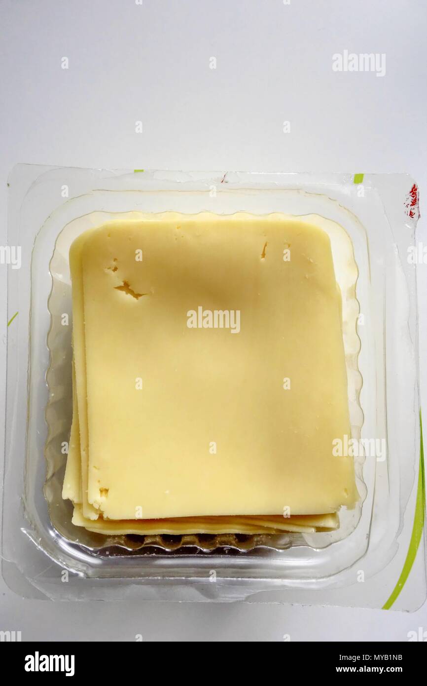 Open packet of Processed Cheese Slices Stock Photo