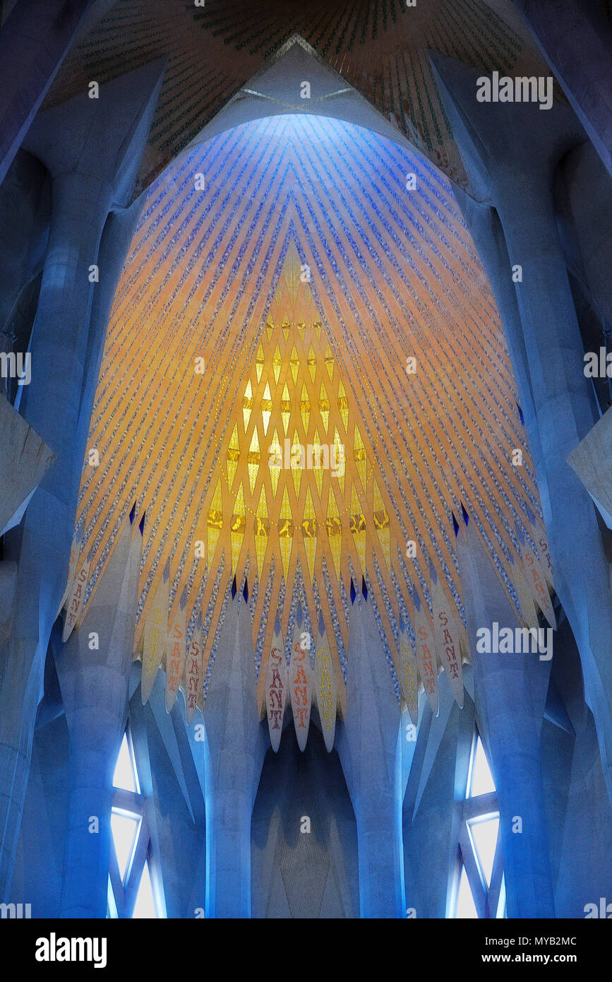 Sagrada Familia, interior, dome at crossing with inlaid colored tile & glass lit from above, by Antoni Gaudí (begun 1892), Barcelona, Catalonia, Spain Stock Photo