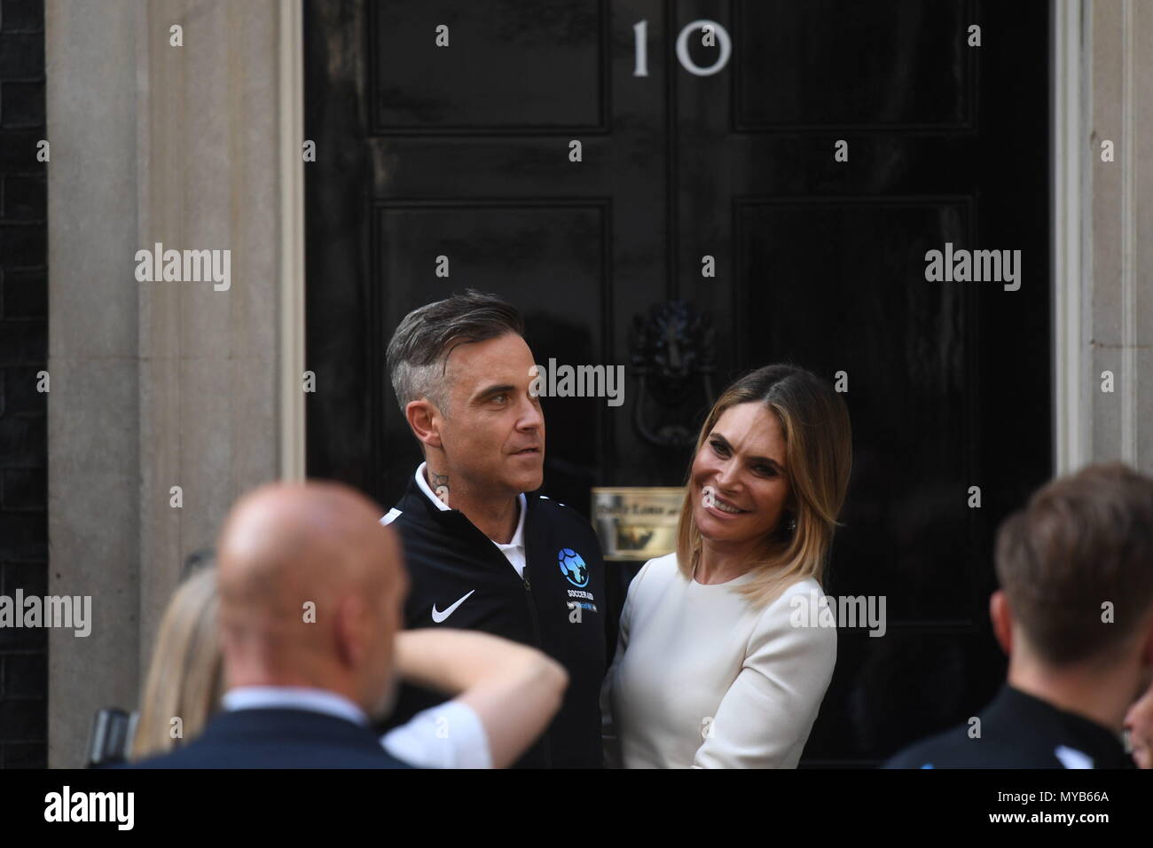 Robbie Williams And Ayda Field Outside The Door Of 10 Downing