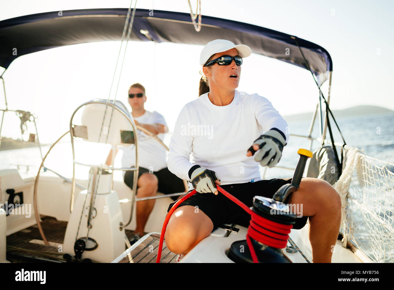 Woman and boat hi-res stock photography and images - Alamy