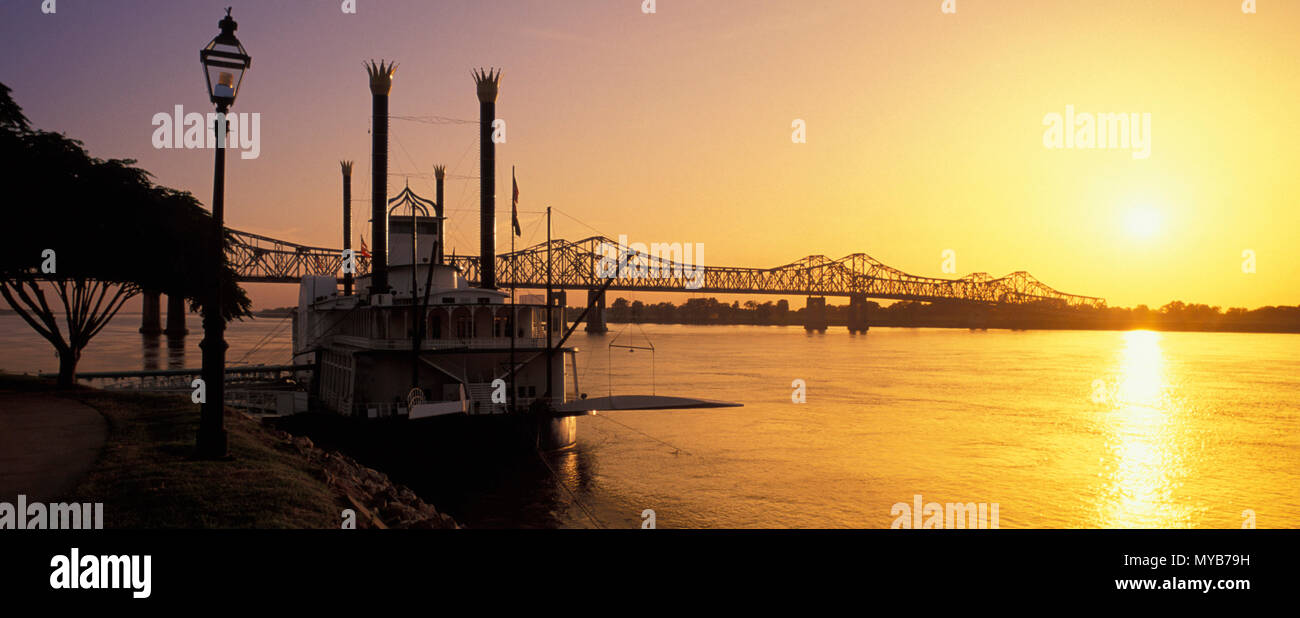 NatchezÐVidalia Bridge at sunset, with steamboat at left, Natchez, Mississippi, USA Stock Photo