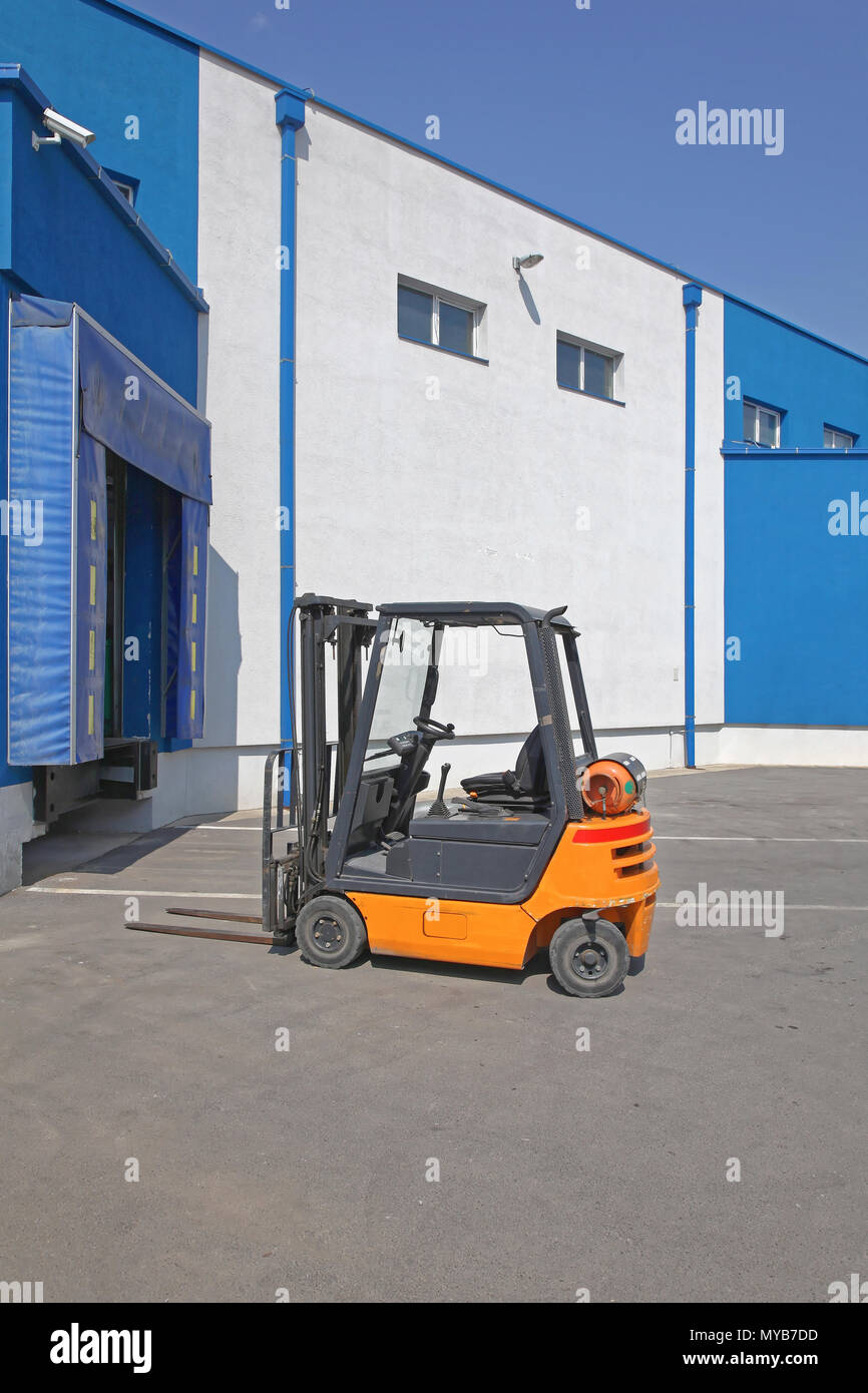Forklift at Distribution Warehouse Loading Dock Stock Photo - Alamy