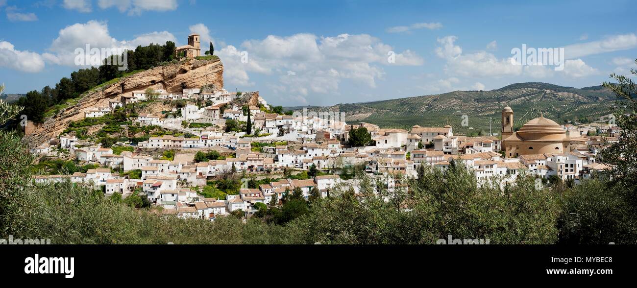 The spectacular Spanish town of Montefrio with its whitewashed houses and its sixteenth century clifftop church in the Granada region of Andalusia. Stock Photo