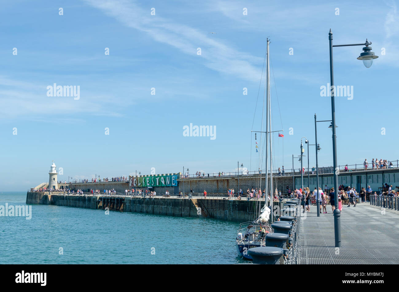 Weekend activities at the Folkestone Harbour Arm by the English channel in Kent, England Stock Photo