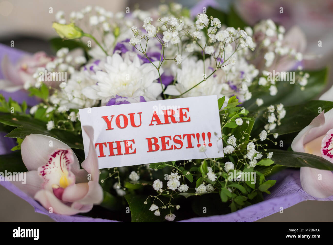 Valentine's day endless love or special occasion concept : beautiful flowers bouquet with orchids. proposal for Marriage. You are the best one. Deep feelings card. Stock Photo