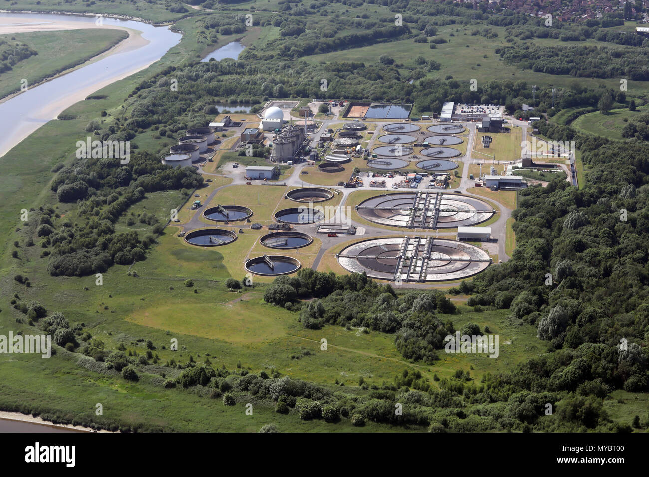 aerial view of a water treatment works, sewage works, at Sankey Bridges by the River Mersey, near Warrington, UK Stock Photo