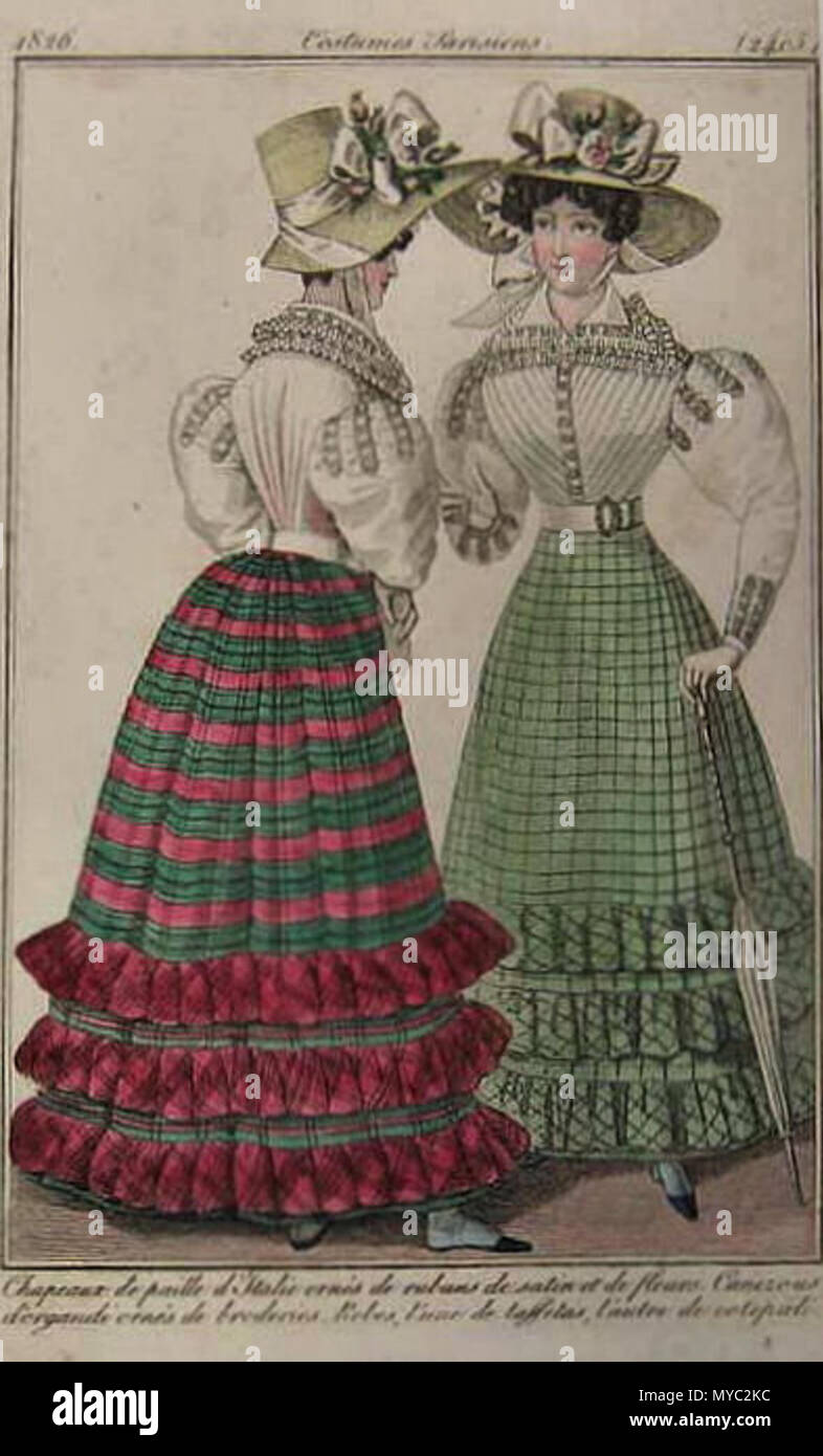 . Hand colored engraved fashion plate from Costumes Parisiens, a French fashion magazine, showing tartan or plaid skirts . 1826 in upper left corner. Unknown 125 Costumes Parisiens 1826 Stock Photo