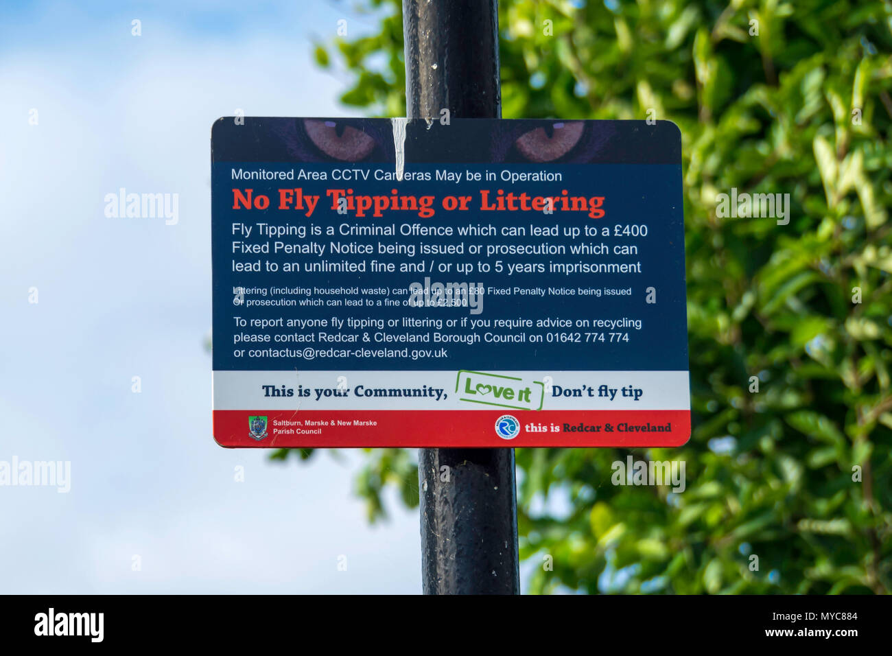 Sign indicating CCTV monitoring and warning of penalties for Fly tipping or Littering in Redcar and Cleveland North Yorkshire Stock Photo