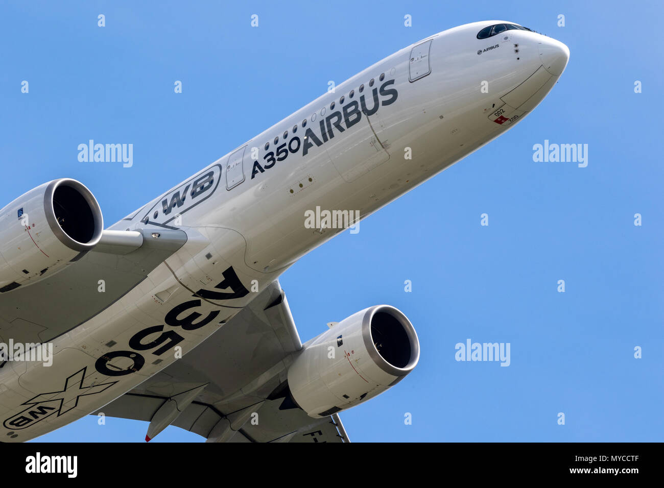 BERLIN - APR 27, 2018: Airbus A350 XWB passenger jet in flight at the Berlin ILA Air Show. Stock Photo