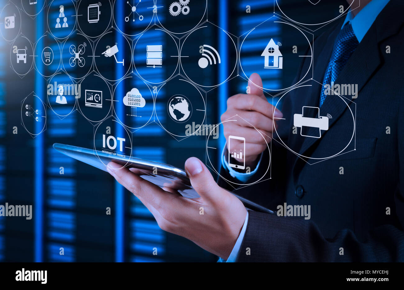Internet of Things (IOT) technology with AR (Augmented Reality) on VR  dashboard. businessman hand using tablet computer and server room  background Stock Photo - Alamy