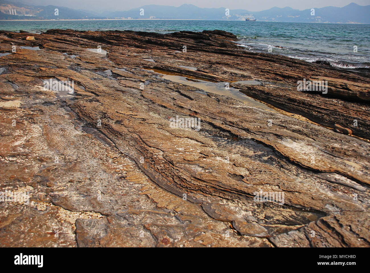 shale rock coast in Tung Ping Chau, remote island in Hong Kong Stock Photo